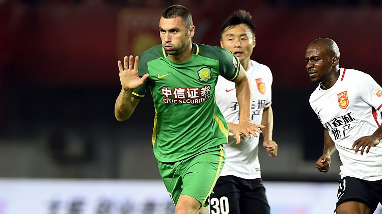 beijing-guoan-acikladi-burak-yilmaz